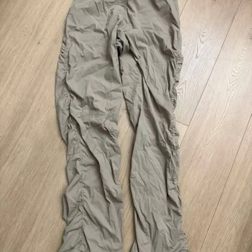 Lululemon Women’s Dance Studio Slim fit high rise flared Pants Size Small Tan